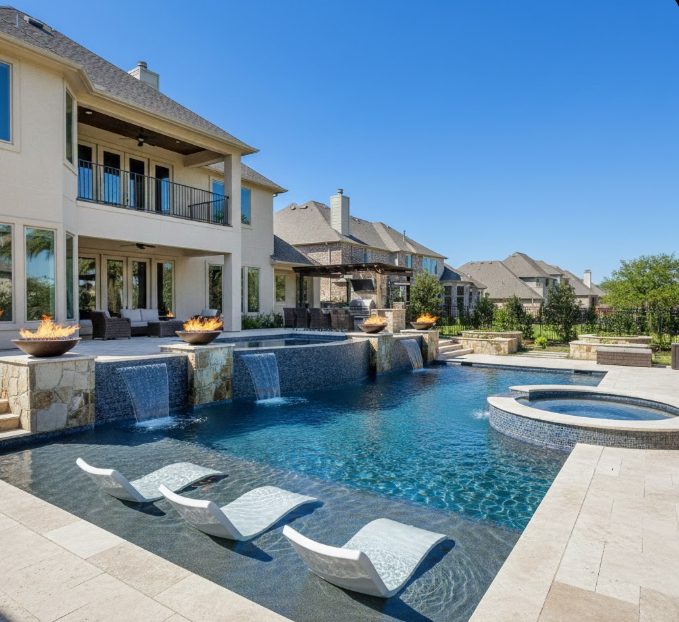 Stone deck and spa detail for custom pool project in The Woodlands